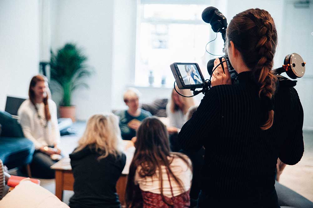 photo of people doing a live recording | photo by vanilla bear films @ unsplash.com